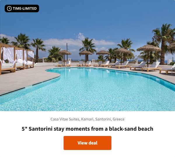 5* Santorini stay moments from a black-sand beach